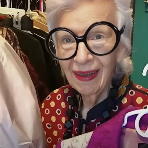 Iris Apfel in her closet selecting clothes