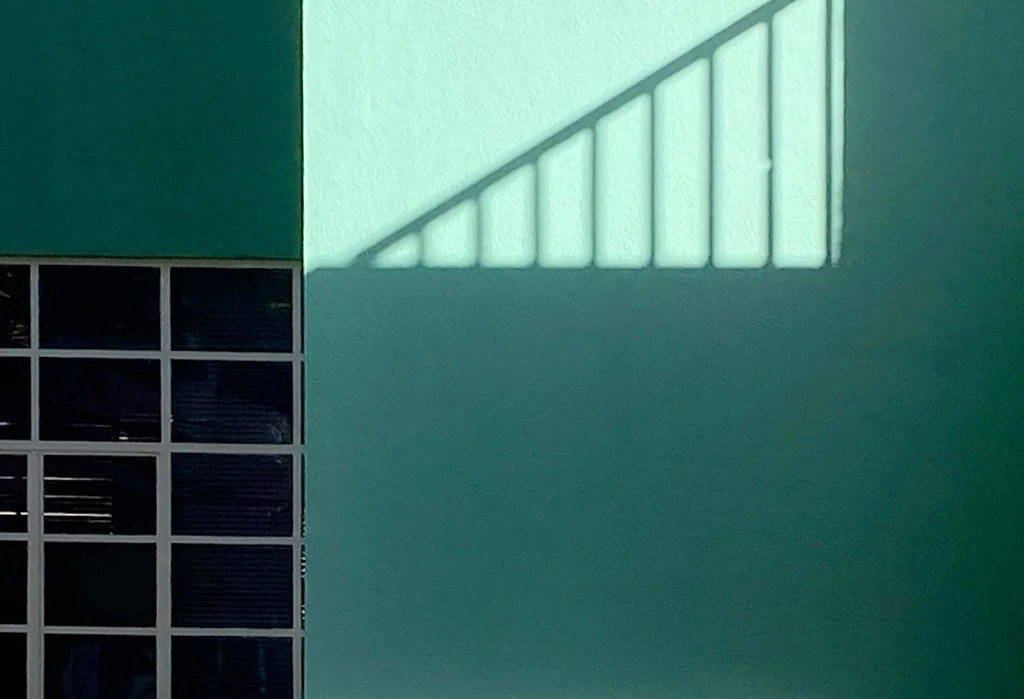 Green wall and shadows