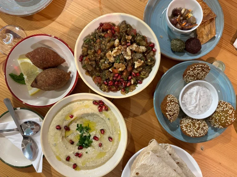 Several dishes at a Middle Eastern restaruarnt , shared dinner Mezze