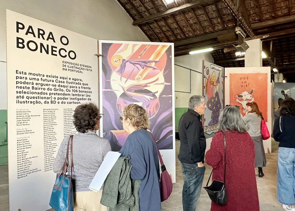 photo of people at the illustration exhibit Beato