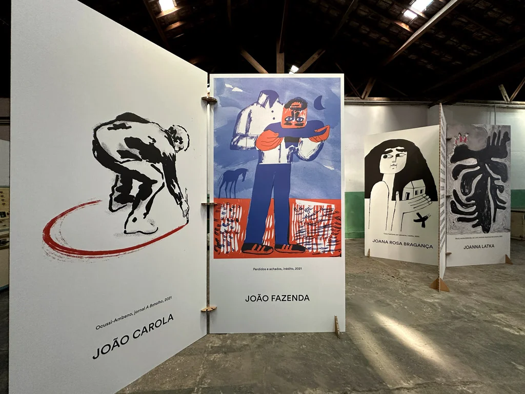 illustration exhibit, illustration on huge book pages on floor,